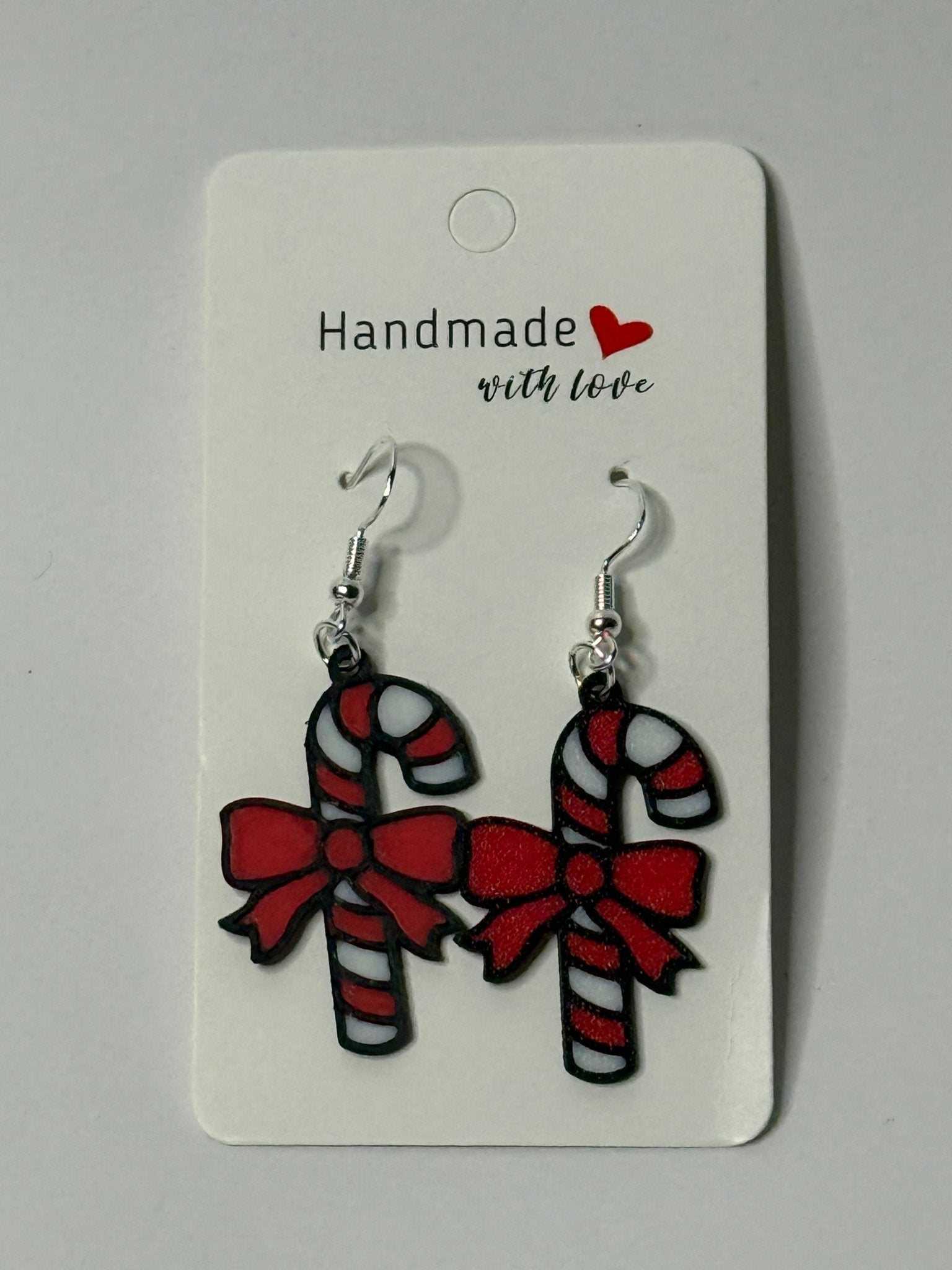 🍬🎀 Candy Cane Bow Earrings - Stratus Forge Technologies