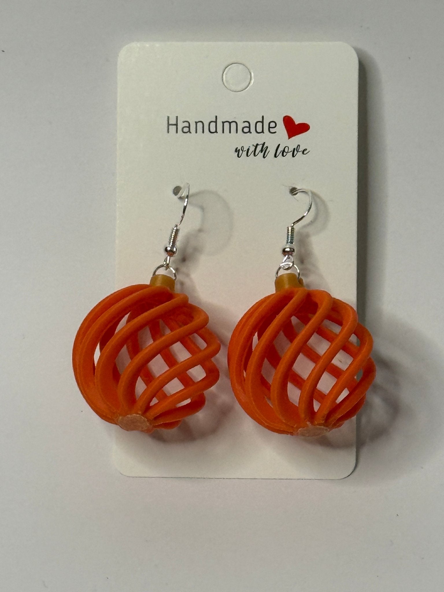 🎃🌀 Orange Spiral Ornament Earrings - Stratus Forge Technologies