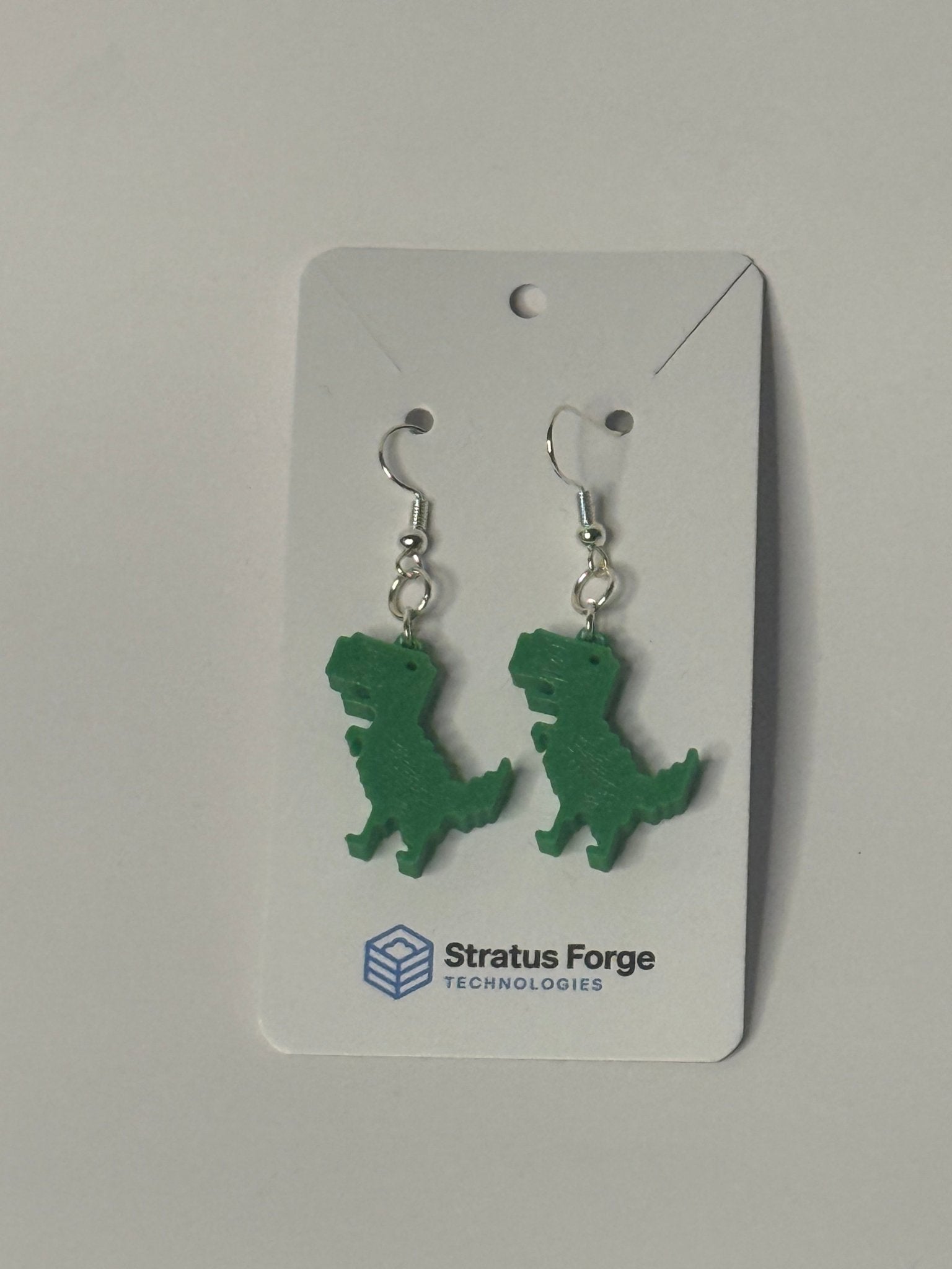 Pixel Dino Earrings – Retro Running Dinosaur Jewelry - Stratus Forge Technologies